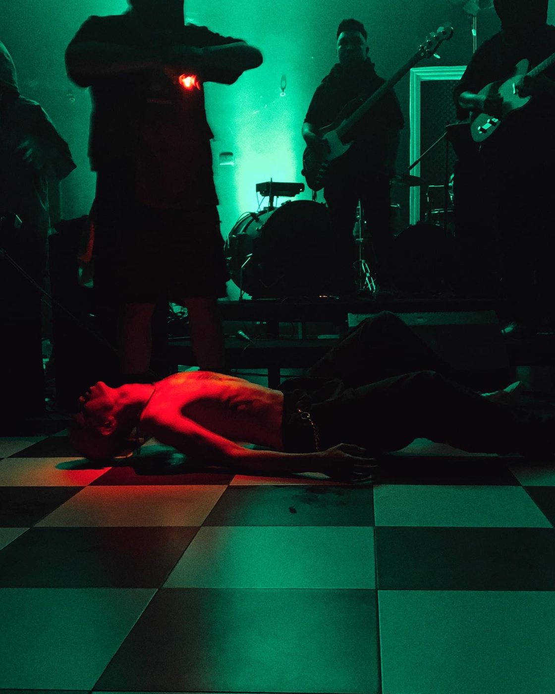 Floor work, with a live band behind